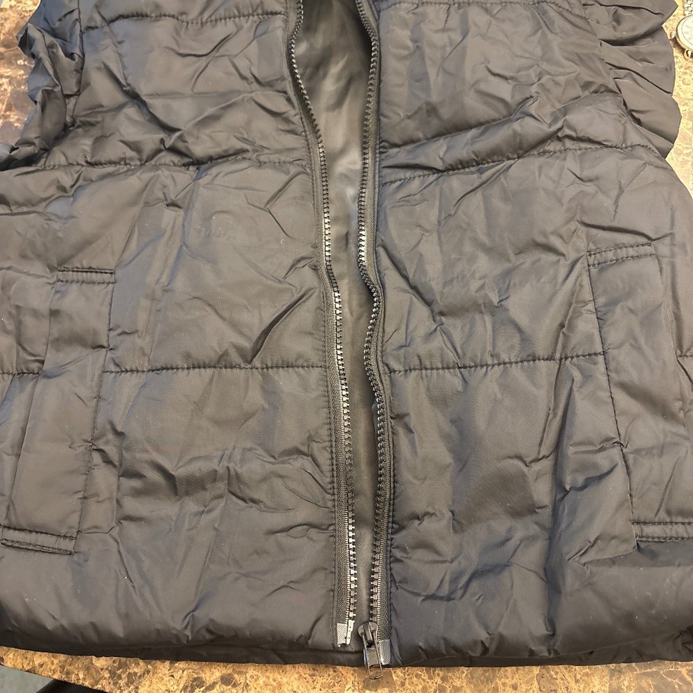 Women’s black vest